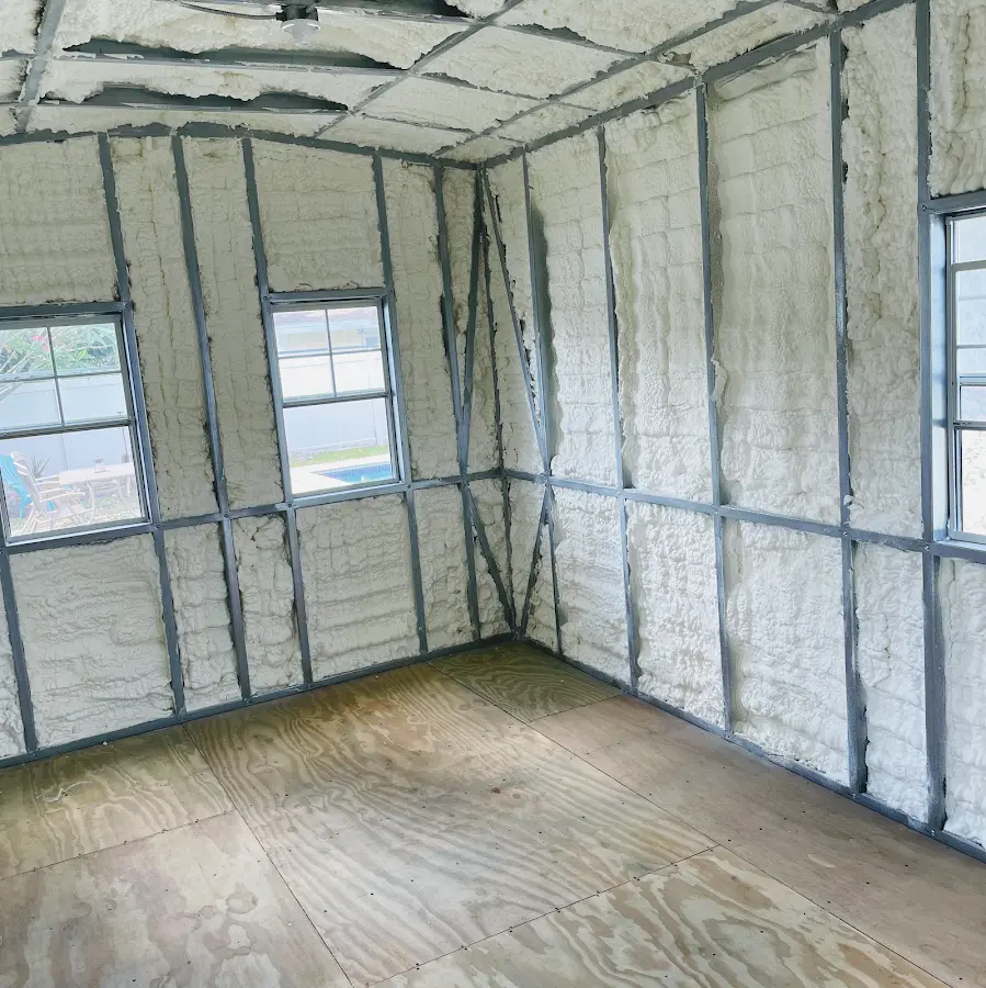 Closed-cell spray foam insulation applied to wall cavities in a residential project in Lewisville